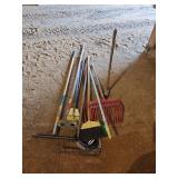 Long handled yard tools, rakes, concrete hoe, brooms etc...