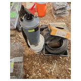 Pump up sprayer, partial bucket of chlorine sanitizer, bed edging, innertubes and poly pan