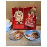 Collector plates and porcelain doll with coat and hat
