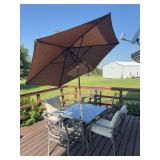 Patio table with umbrella and six chairs (cushions never left outdoors)