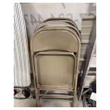 Seven folding chairs