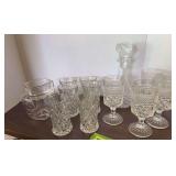 Clear glass pitcher, decanter and glasses for each