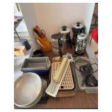 Bread pans, knife block, coffee pot, coffee pot, coffee pot and more.