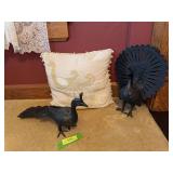Pair of cast metal peacocks and accompanying pillow