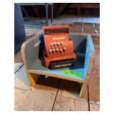Vintage wooden booster seat and Tom Thumb cash register