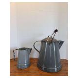 Two grey granite ware cowboy coffee pots, smaller one missing lid