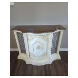 French Provincial-Style Console-with cream and gold-accented cabinet doors featuring intricate lattice speaker grilles. Radio, cassette player, record player does not work