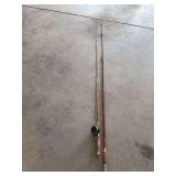 Bamboo fishing poles, one with PEMCO fly real-one has a broken tip