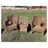 Two plastic wicker patio chairs and plastic wicker storage box
