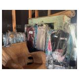 Large assortment of ladies size large and extra large individually packed and marked clothing items, including lots of designer and brand names! 35-40 pieces!