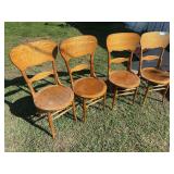 Set of four matching antique wood chairs