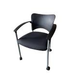 Amicus guest arm chair on casters.