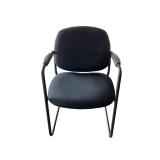 Guest chair with arm rests. Black fabric & metal