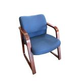 HON side chair. Dark blue upholstery & wood frame.
