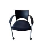Amicus guest arm chair on casters.
