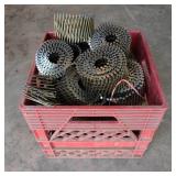 Milk Crate Full of 2 1/2 Inch Coiled Nails
