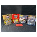 4 New in Box 1:64 race cars