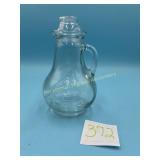 Clear glass pitcher with Sailboat design
