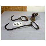 2 Primitive hay hooks and cow bell on leather