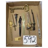 8 various letter openers with ND money clip