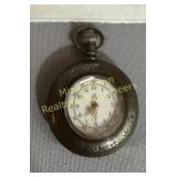 Antique engraved silver pocket watch with gold