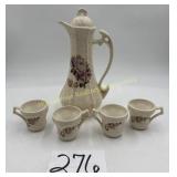Unmarked pitcher with 4 cups