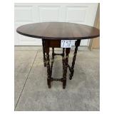 Antique gate leg drop leaf table, dark finish,