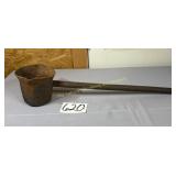 Heavy primitive lead pour ladle molten metal into