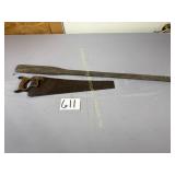 Primitive Hand saw and wood paddle