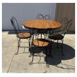 Parlor table with 4 chairs, black rod iron base
