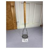 Institutional size wood handled masher