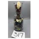 Glass Wine Carafe full of Vintage Costume Jewelry