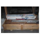 Box of Laminate flooring, caulking gun and light