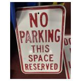 NO PARKING THIS SPACE RESERVED METAL SIGN