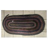BRAIDED RUG APPROX 48" X 22"