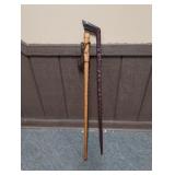 (2) WOODEN HAND CARVED WALKING STICKS APPROX 36"