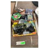 Assorted DVDs, cords, headphones