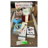 Atari console, popcorn maker, selfie stick &