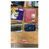 Notebooks, binder, storage cup, pencil cases