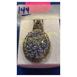 .925 pendent w/ light purple stones