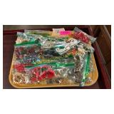 Tray of necklaces in bags