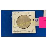 1 silver UNC Franklin half dollar