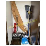 Pile of mops, dusters, salt, misc