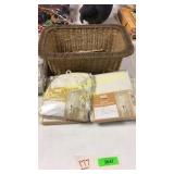 Sheer curtains, wicker basket , table cloth