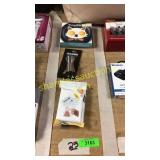 Baby wipes, cocktail jigger, egg mold