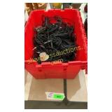 Tote of assorted speaker cords