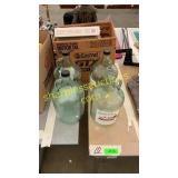 Box of books, glass wine jugs