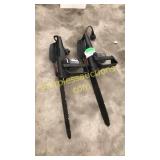 Two Remington electric chain saws