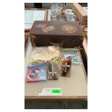 Trunk, crucifix book stoppers,