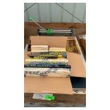 Tile cutter, books, wooden holders